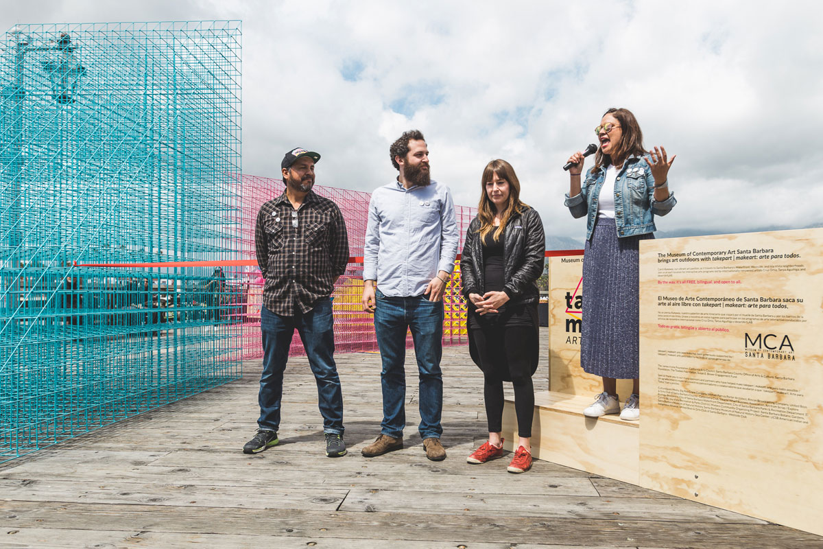 MCASB Executive Director Miki Garcia kicks off the ribbon cutting ceremony for Runaway on Stearns Wharf on March 26, 2017with artist Cruz Ortiz and designers Greg Corso and Molly Hunker of SPORTS standing by.